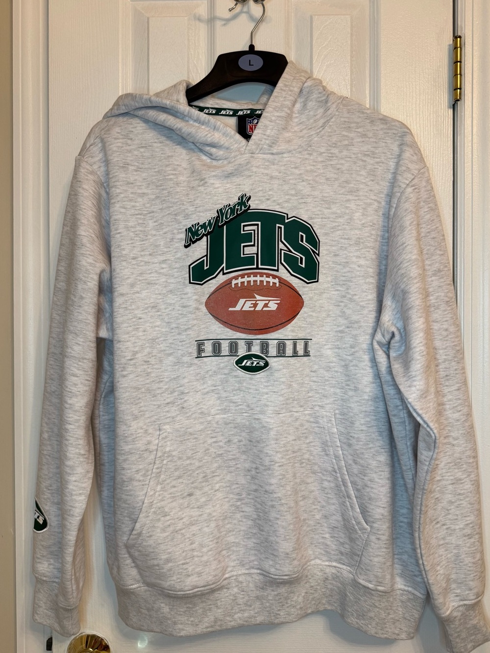 Official NFL New York Jets hooded sweatshirt by Primark.